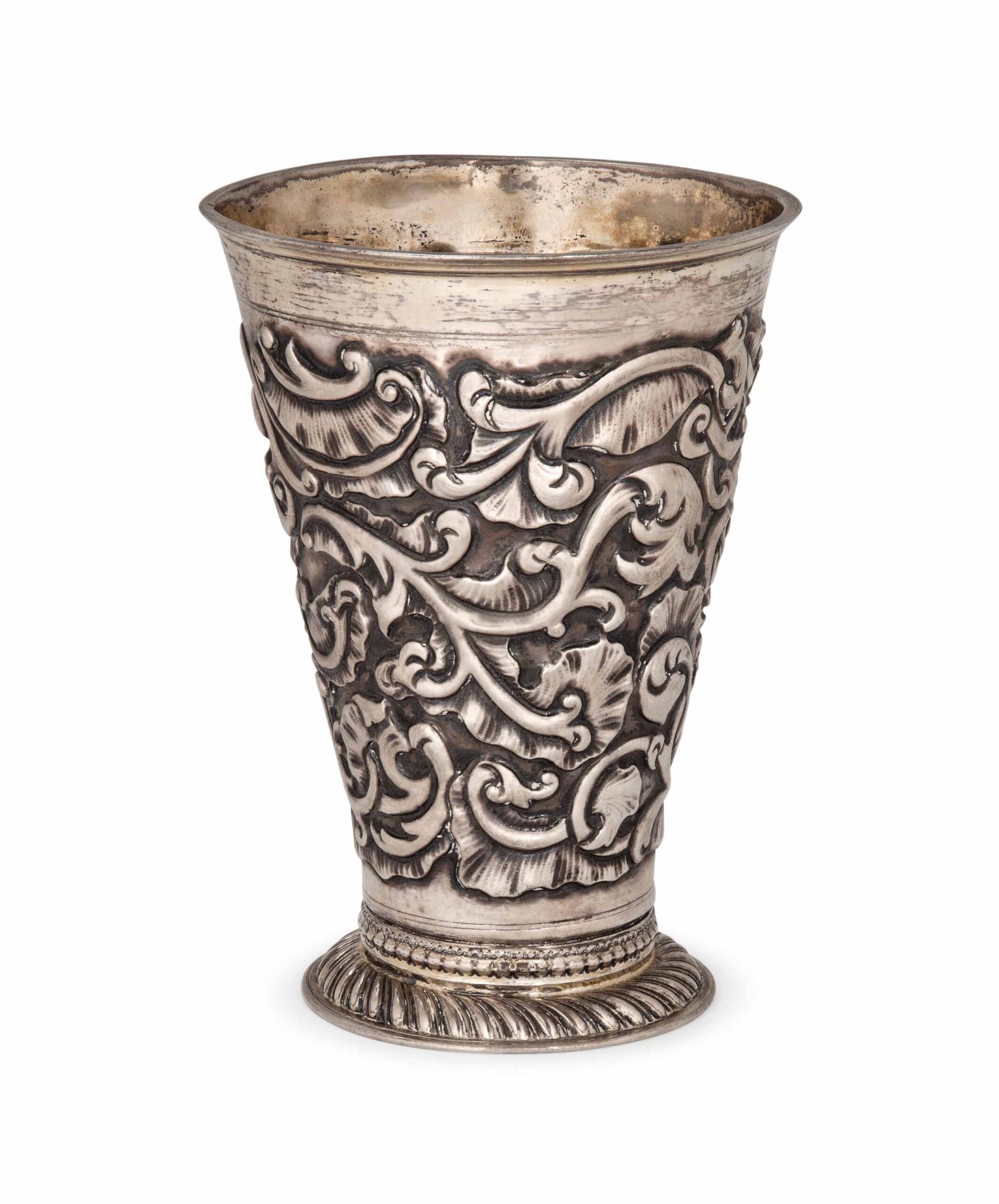 A BALTIC (LATVIAN) PARCEL-GILT SILVER ROCOCO BEAKER