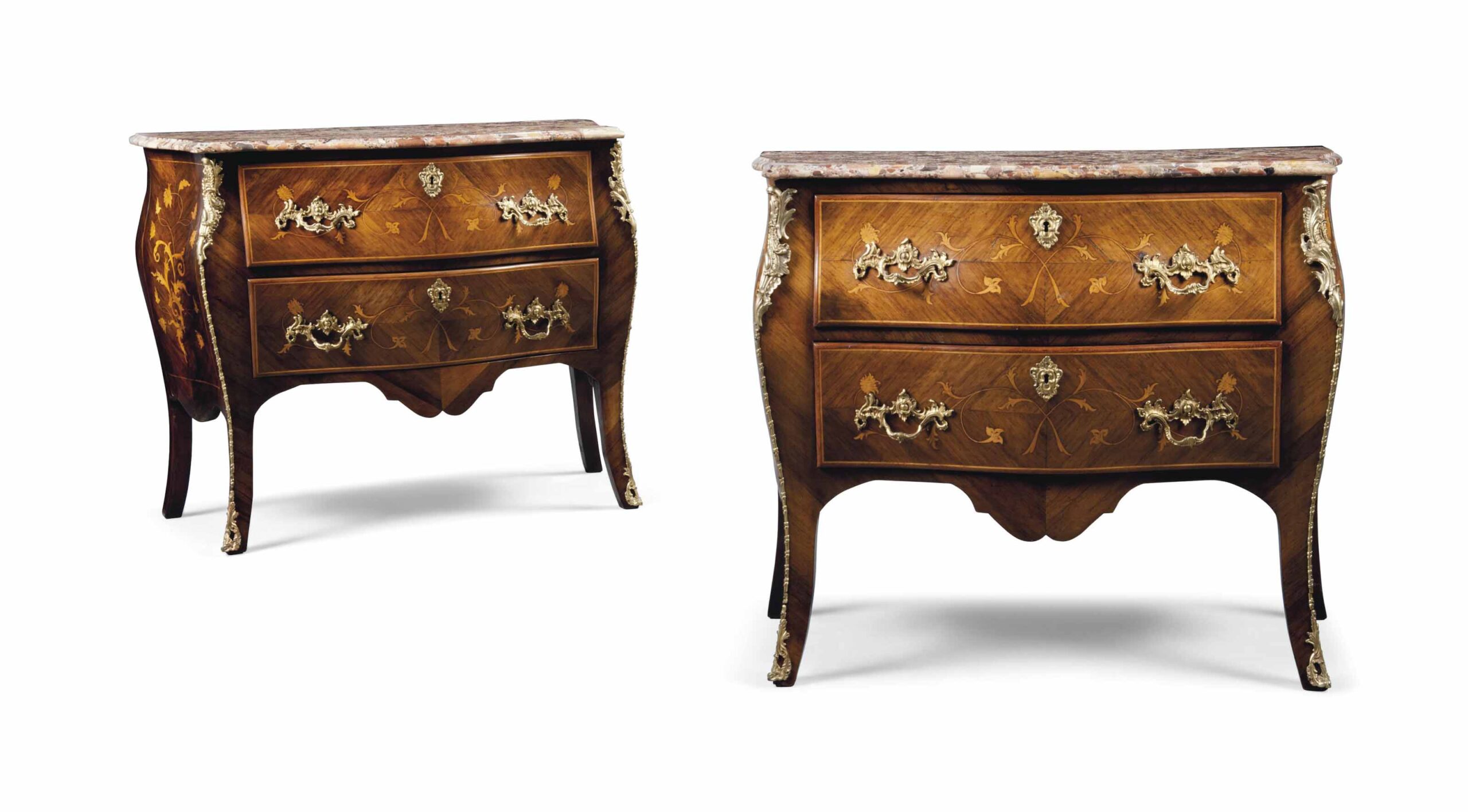 A PAIR OF FRENCH KINGWOOD AND FLORAL MARQUETRY SERPENTINE COMMODES