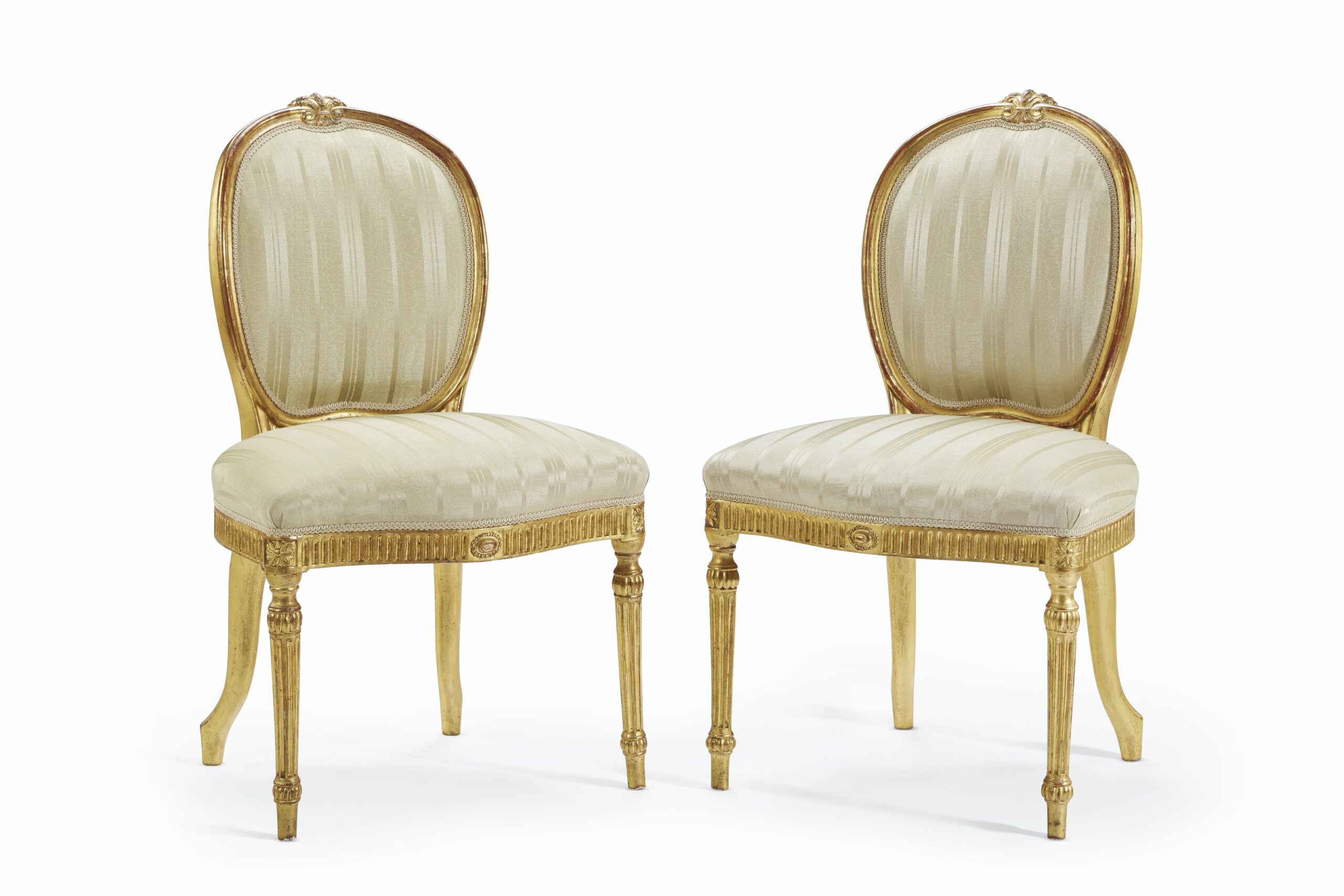 A PAIR OF GEORGE III GILTWOOD SIDE CHAIRS