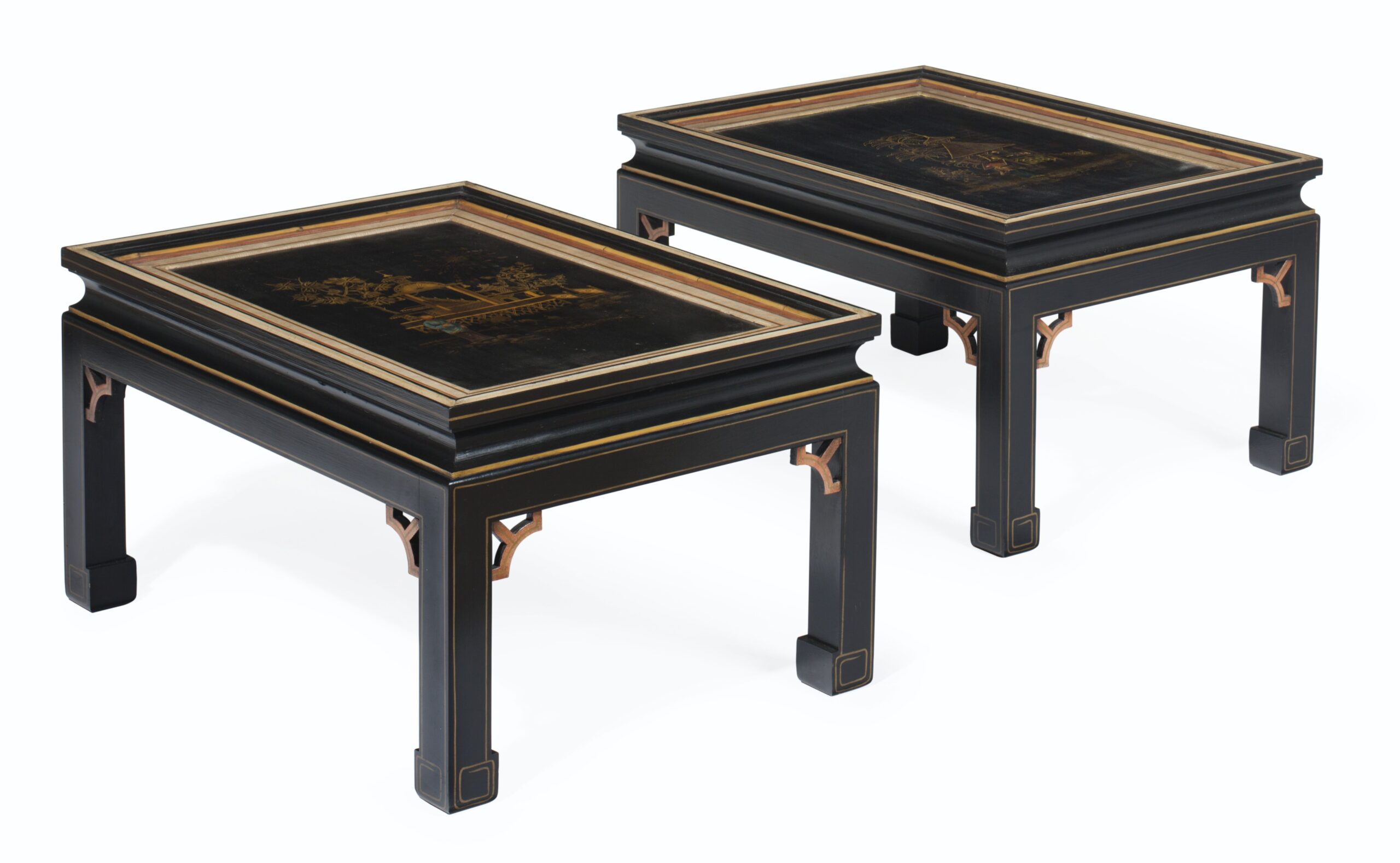 A PAIR OF JAPANNED AND DECOUPAGE SCREEN PANELS MOUNTED AS LOW TABLES