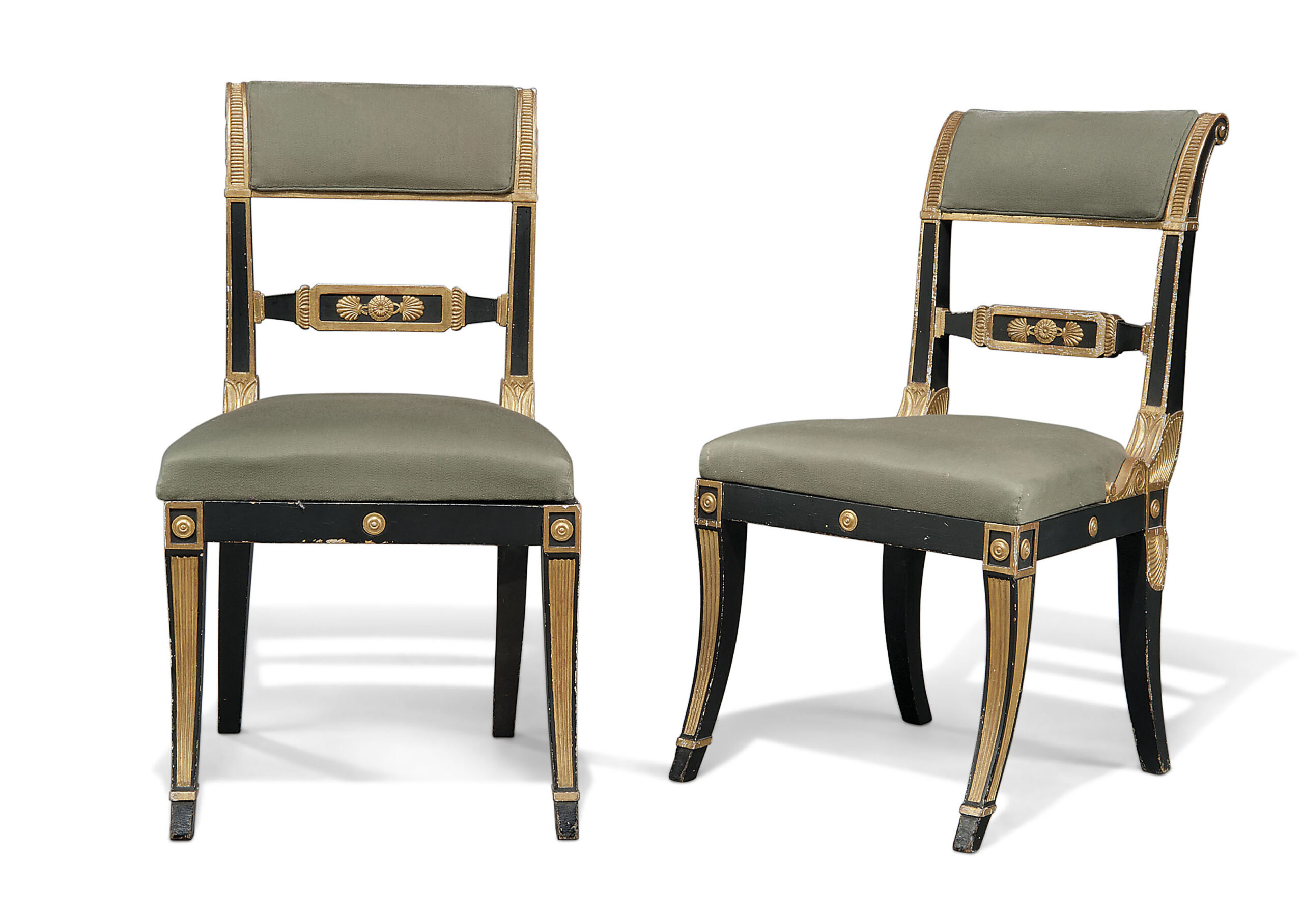 A PAIR OF REGENCY BLACK-PAINTED AND PARCEL-GILT SIDE CHAIRS