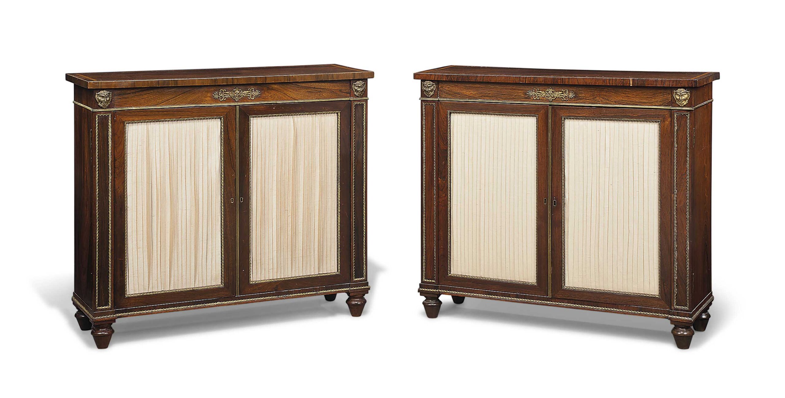 A PAIR OF REGENCY ORMOLU-MOUNTED ROSEWOOD SIDE CABINETS